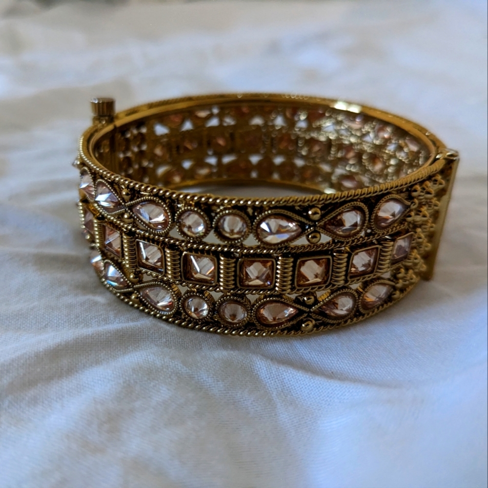 Designer gold diamond encrusted thick bracelet